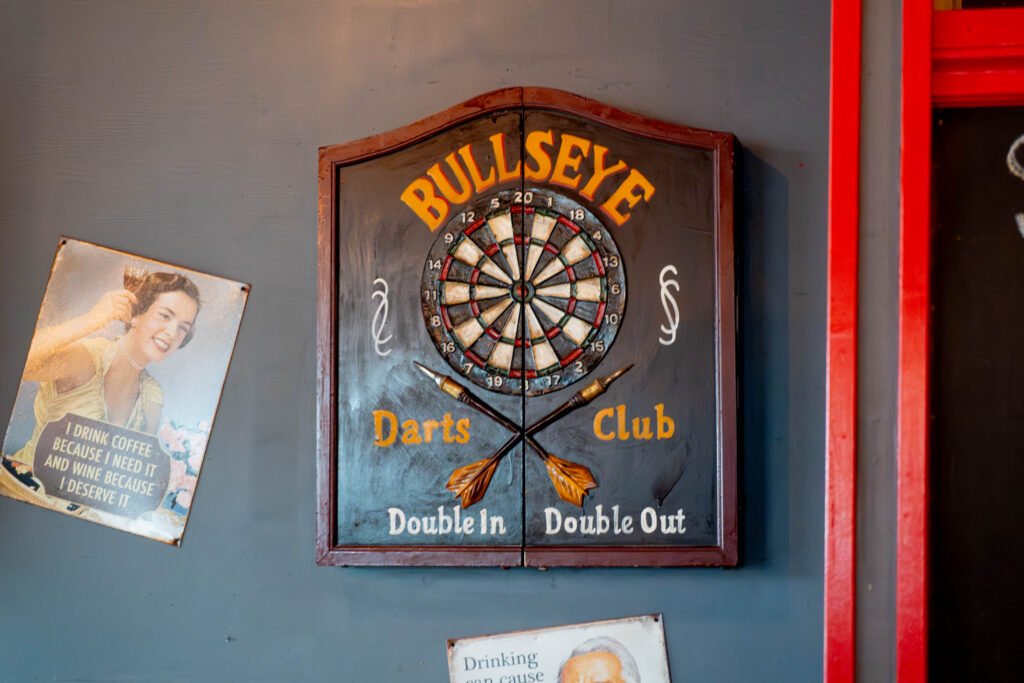 Dartboard mounted on the pub wall