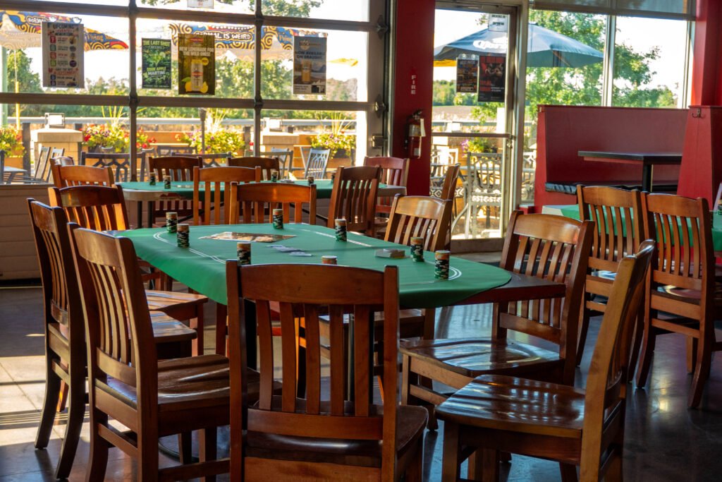 Poker table and chairs set up inside the pub